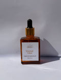 Photograph of an SOS 4:7 Eternal Glow Organic Anti-Aging Face Oil in an amber square glass bottle with a gold and black dropper, featuring a white label with a leaf motif, presented on a minimalist white background with a cast shadow
